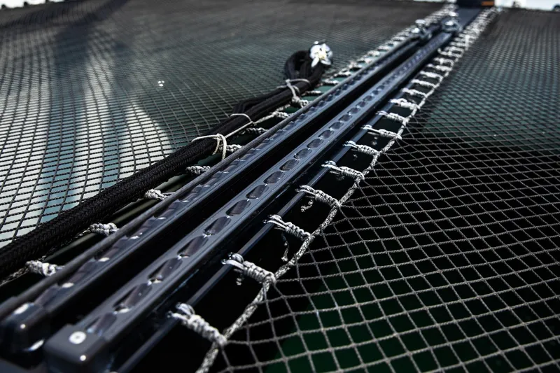  Yacht Photos Pics Close-up of 2022 HH Catamarans HH55 netting and rigging details.