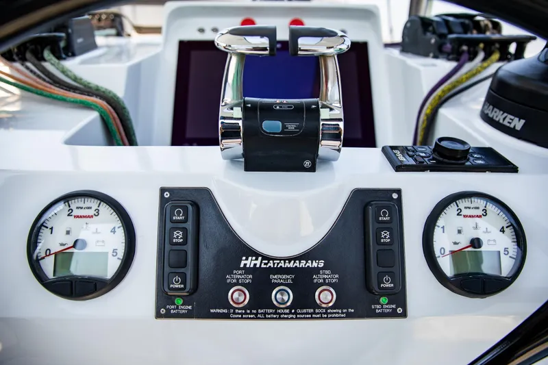  Yacht Photos Pics Control panel of 2022 HH Catamarans HH55 with gauges and throttle levers.