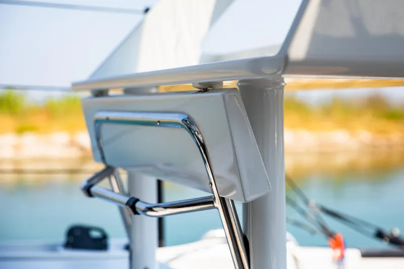  Yacht Photos Pics Close-up of 2022 HH Catamarans HH55 yacht's sleek railing and structure.