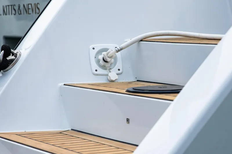  Yacht Photos Pics Staircase on 2022 HH Catamarans HH55 with hose connection, teak steps.