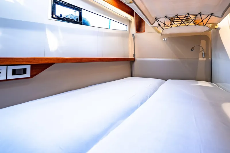  Yacht Photos Pics Interior cabin of 2022 HH Catamarans HH55 with twin beds and modern design.
