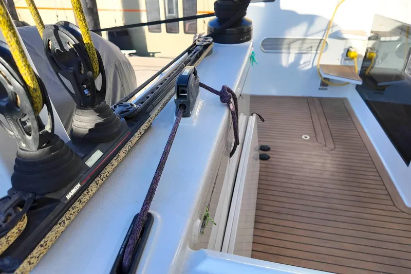  Yacht Photos Pics Deck of 2022 HH Catamarans HH55 with rigging and teak flooring.