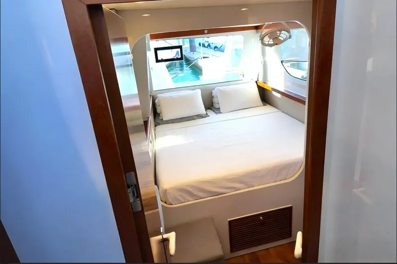  Yacht Photos Pics Luxurious bedroom interior of 2022 HH Catamarans HH55 yacht with modern design.