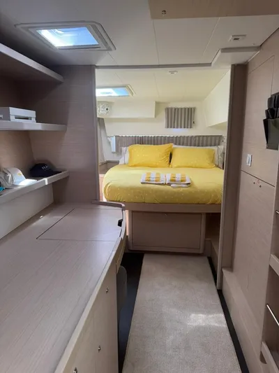 Alegria Yacht Photos Pics Interior of 2020 Lagoon 42 catamaran with cozy bedroom and modern furnishings.