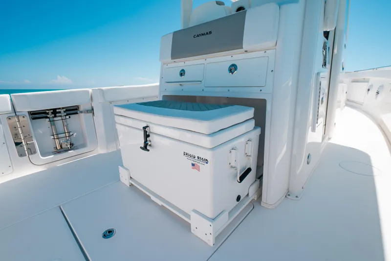  Yacht Photos Pics 2023 Caymas 341 CC boat interior with storage and seating.