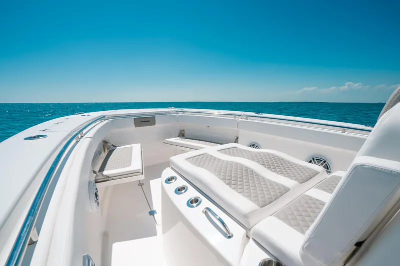  Yacht Photos Pics 2023 Caymas 341 CC boat interior with luxurious seating and ocean view.