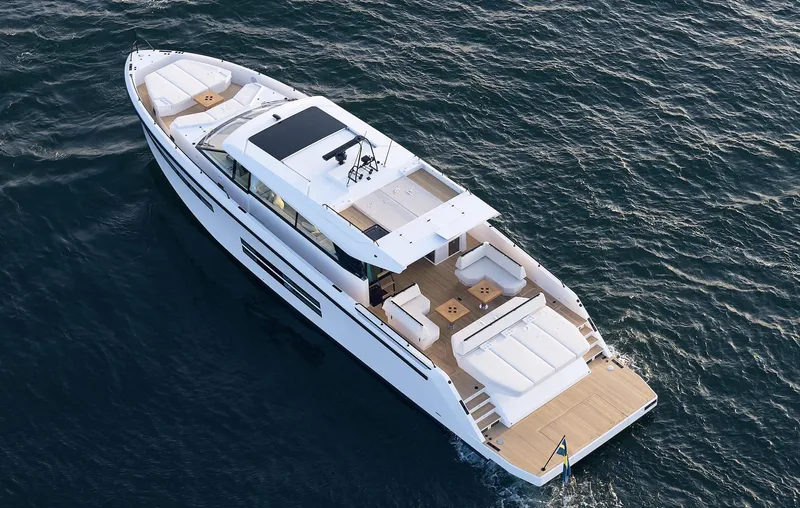  Yacht Photos Pics Aerial view of 2026 Delta Powerboats 72 yacht cruising on open water.