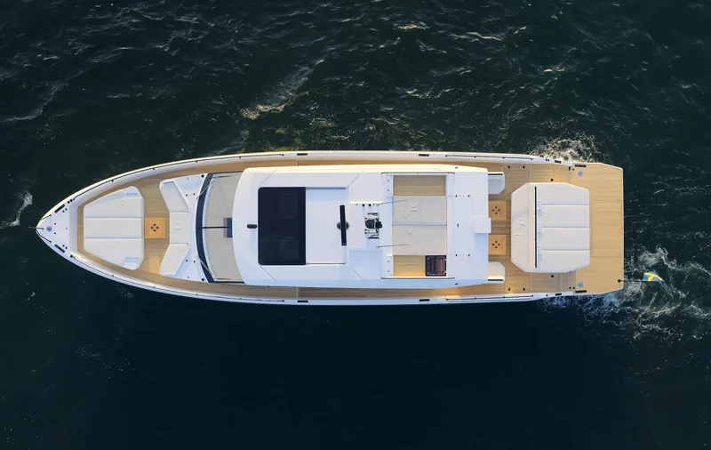  Yacht Photos Pics Top view of 2026 Delta Powerboats 72 yacht cruising on the ocean.