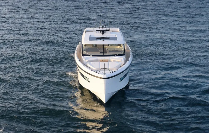  Yacht Photos Pics Delta Powerboats 72 yacht, 2026 model, cruising on open water.