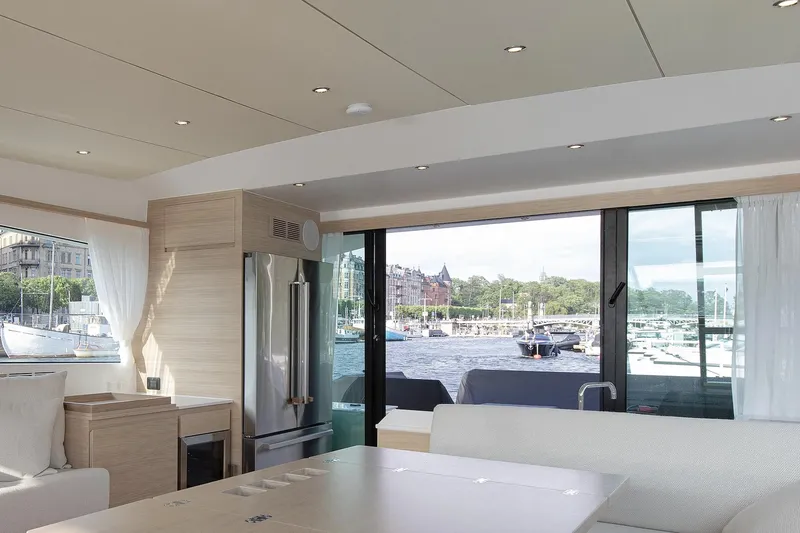  Yacht Photos Pics Luxurious interior of 2026 Delta Powerboats 72 with waterfront view.