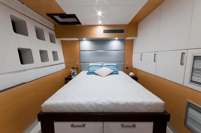 Mulan Yacht Photos Pics Luxurious bedroom interior on 2012 Sunreef 70 Sailing yacht with modern design and cozy bedding.