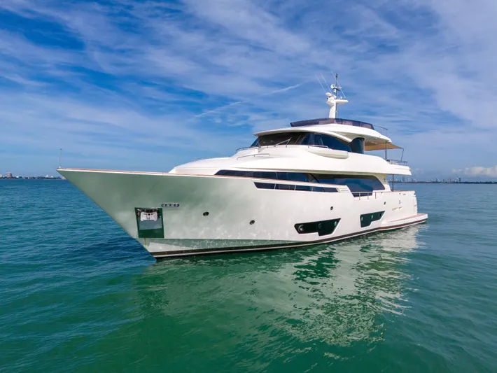 D'vinci Yacht Photos Pics Luxurious 2015 Custom Line Navetta 28 yacht cruising on clear blue waters.