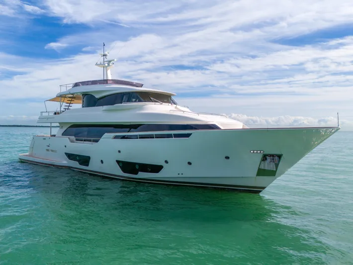 D'vinci Yacht Photos Pics Luxurious 2015 Custom Line Navetta 28 yacht on serene ocean waters.