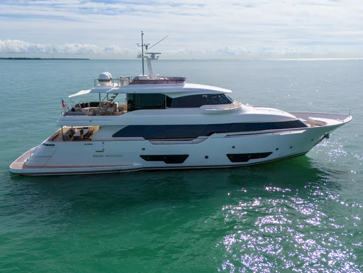 D'vinci Yacht Photos Pics Luxurious 2015 Custom Line Navetta 28 yacht cruising on calm waters.
