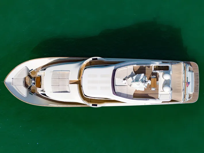 D'vinci Yacht Photos Pics Aerial view of 2015 Custom Line Navetta 28 yacht on green water.