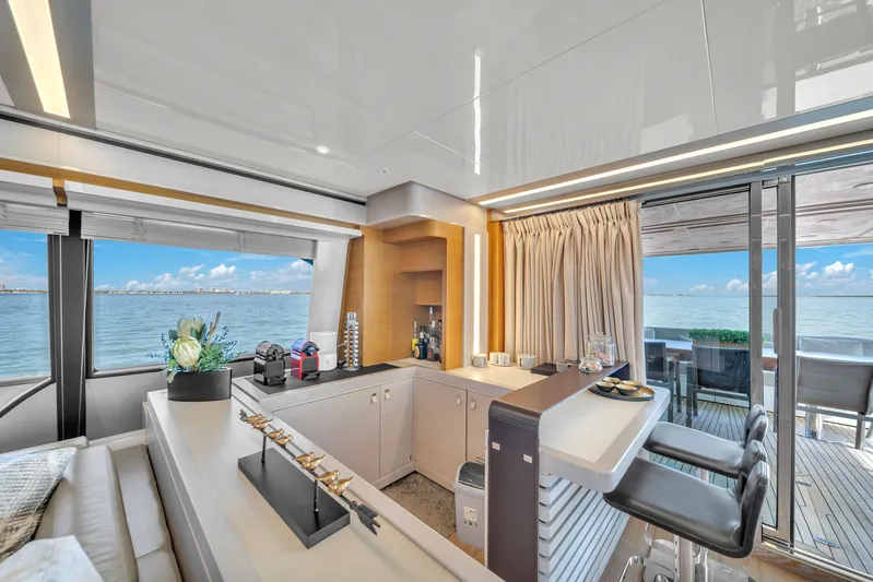 D'vinci Yacht Photos Pics Luxurious interior of 2015 Custom Line Navetta 28 yacht with ocean view.