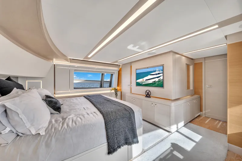 D'vinci Yacht Photos Pics Luxurious bedroom interior on 2015 Custom Line Navetta 28 yacht with ocean view.