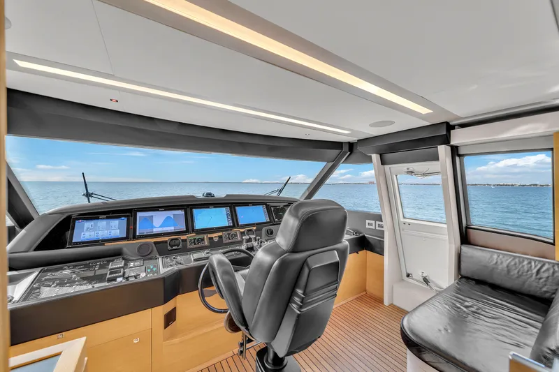 D'vinci Yacht Photos Pics Luxurious 2015 Custom Line Navetta 28 yacht cockpit with ocean view and modern controls.