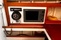 Boat navigation station with clock, radio, and Furuno display, Custom Design #1862, 1967.
