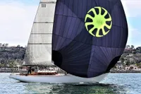 Sailing yacht "Design #1862" by Driscoll Boat Works, 1967, with large spinnaker on water.