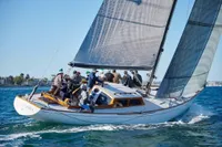 Sailboat "Design #1862" by Driscoll Boat Works, 1967, sailing with crew on open water.