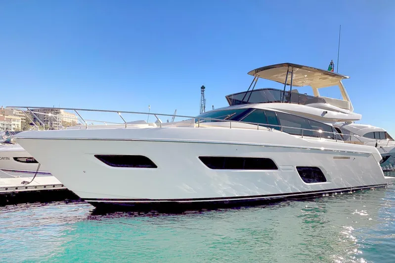  Yacht Photos Pics Luxury 2020 Ferretti Yachts 550 docked in a sunny marina.