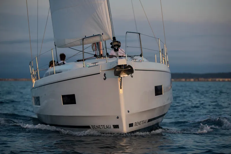  Yacht Photos Pics 2026 Beneteau 40.1 sailboat cruising on open water at sunset.