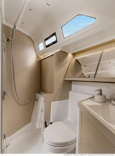  Yacht Photos Pics Modern bathroom interior of 2026 Beneteau 40.1 yacht, featuring sleek design and natural lighting.
