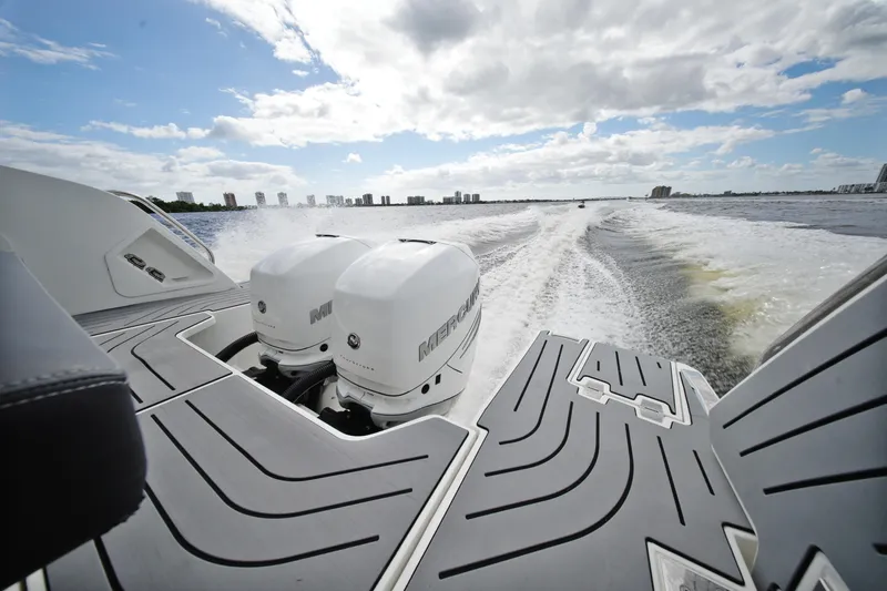  Yacht Photos Pics 2023 Galeon 400 XL boat with dual Mercury engines cruising on open water.