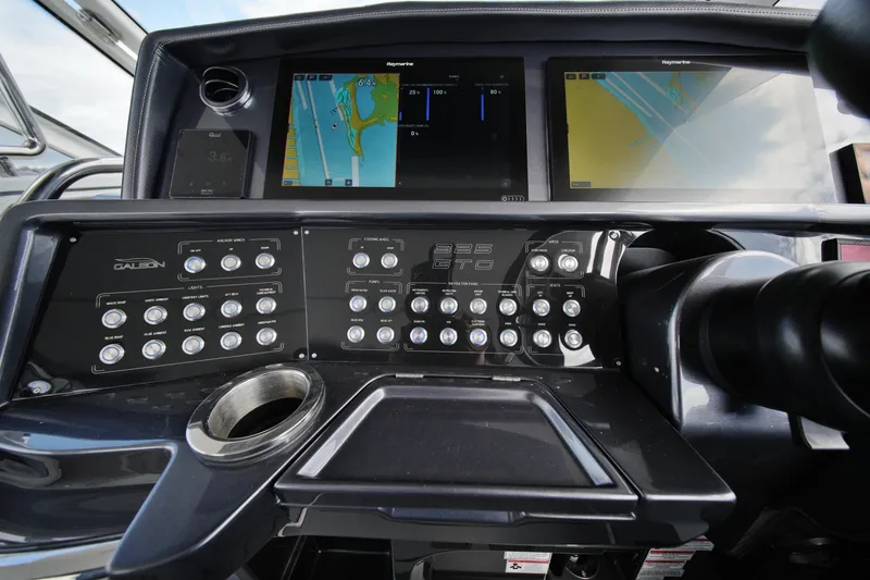  Yacht Photos Pics Control panel of 2023 Galeon 400 XL yacht with navigation screens and buttons.
