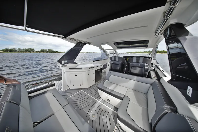  Yacht Photos Pics Luxurious interior of 2023 Galeon 400 XL yacht with sleek seating and water view.