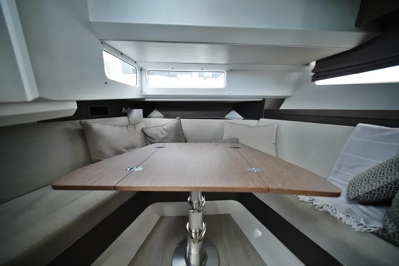  Yacht Photos Pics Luxurious interior of 2023 Galeon 400 XL yacht with elegant seating and wooden table.