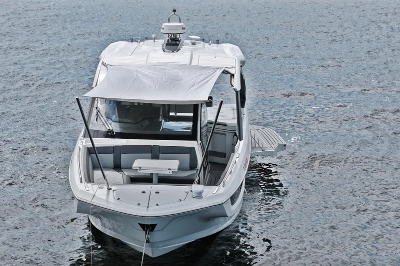  Yacht Photos Pics 2023 Galeon 400 XL yacht on water, featuring sleek design and spacious deck.