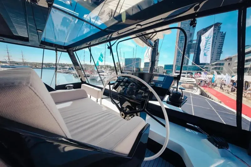  Yacht Photos Pics Modern 2024 Wave60 yacht cockpit with panoramic marina view.