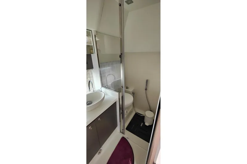  Yacht Photos Pics Bathroom interior of 2025 Cranchi Z35 yacht, featuring modern fixtures and compact design.