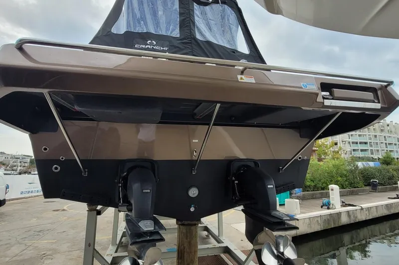  Yacht Photos Pics 2025 Cranchi Z35 yacht rear view with dual propellers at marina.