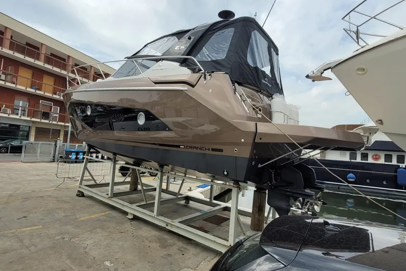  Yacht Photos Pics 2025 Cranchi Z35 yacht on dry dock, showcasing sleek design and modern features.