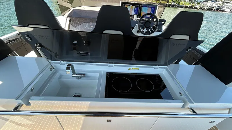  Yacht Photos Pics Outdoor kitchen on 2025 De Antonio Yachts D36, featuring sink and stove.