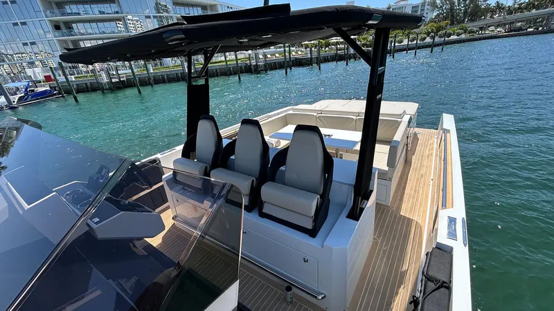  Yacht Photos Pics 2025 De Antonio Yachts D36 on water, featuring sleek design and modern seating.