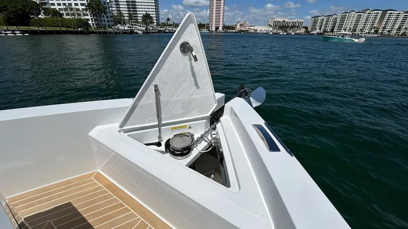  Yacht Photos Pics 2025 De Antonio Yachts D36 anchor compartment with scenic waterfront view.