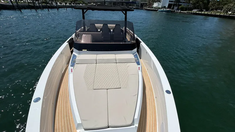  Yacht Photos Pics 2025 De Antonio Yachts D36 with spacious deck and luxurious seating on the water.