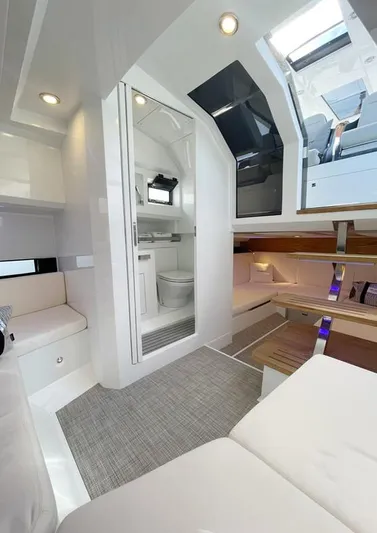  Yacht Photos Pics Luxurious interior of 2025 De Antonio Yachts D36, featuring modern seating and sleek design.