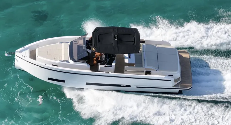  Yacht Photos Pics 2025 De Antonio Yachts D36 cruising on turquoise waters, top view.