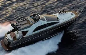 Happy Go Lucky Yacht Photos Pics 2009 Riva SportRiva 56 yacht cruising on open water at high speed.