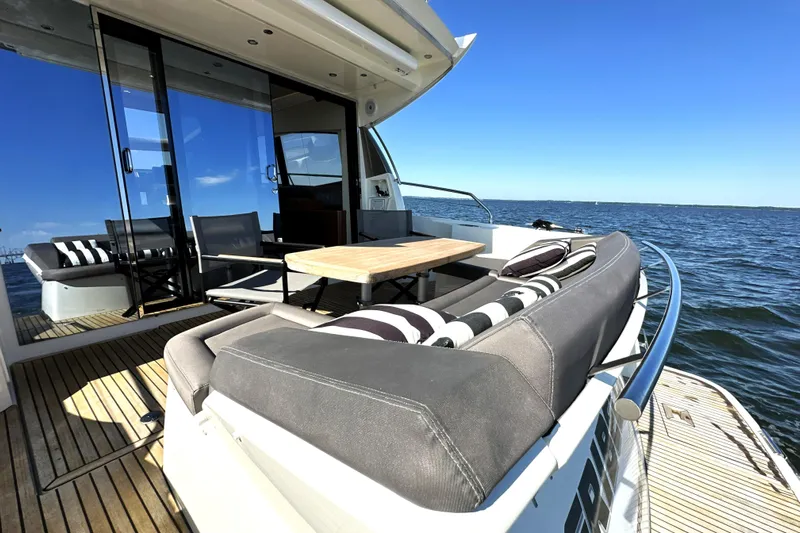 Eribella Yacht Photos Pics Luxurious 2016 Prestige 500 S yacht deck with stylish seating and ocean view.