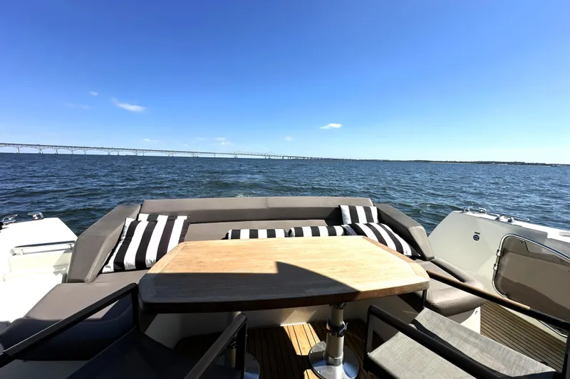 Eribella Yacht Photos Pics Luxury seating area on 2016 Prestige 500 S yacht with ocean view.