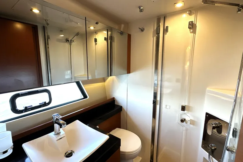 Eribella Yacht Photos Pics Luxurious bathroom interior of 2016 Prestige 500 S yacht with modern fixtures.