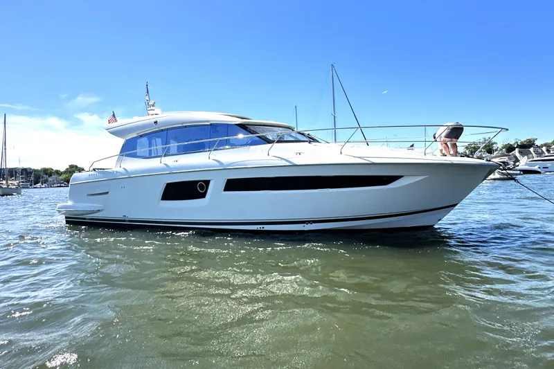 Eribella Yacht Photos Pics 2016 Prestige 500 S yacht on water, sunny day, marina background.