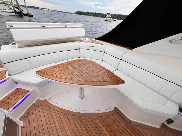  Yacht Photos Pics 2014 Sea Ray 350 SLX boat with elegant white seating and wooden deck.