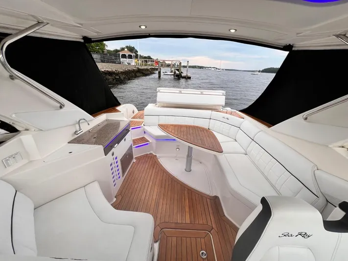  Yacht Photos Pics Luxurious 2014 Sea Ray 350 SLX boat interior with elegant seating and scenic water view.